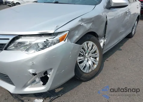 2014 Toyota Camry Le z USA, uszkodzony, nr VIN 4T4BF1FK7ER391929